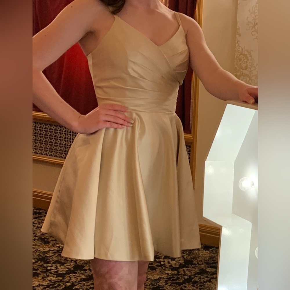 Cream satin cocktail dress with adjustable straps and corset back - size 4